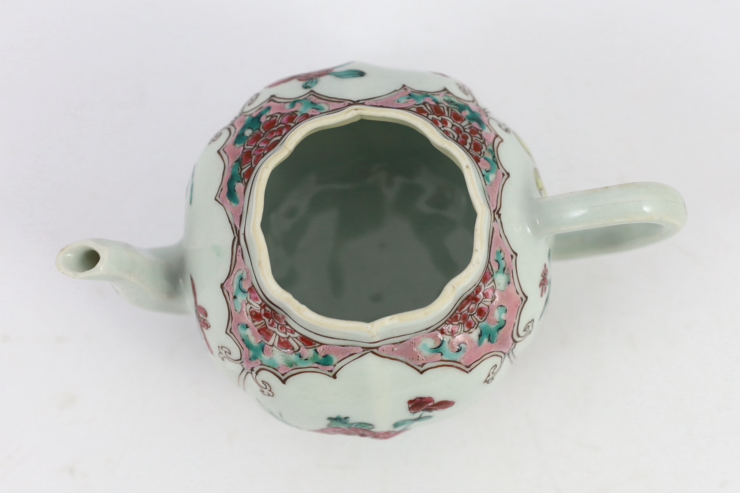 A Chinese famille rose petal lobed teapot, Yongzheng period, minor faults